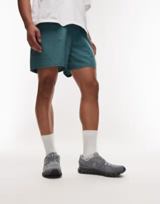 Tênis ON Cloud 6 para uso diário nas cores cinza e eclipse.